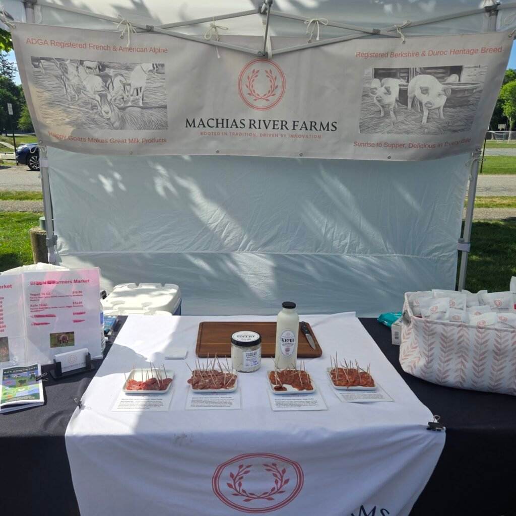 Machias River Farms booth at the farmers market